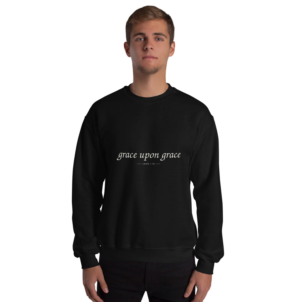Grace Upon Grace Christian unisex crewneck sweatshirt in Black, front view on model