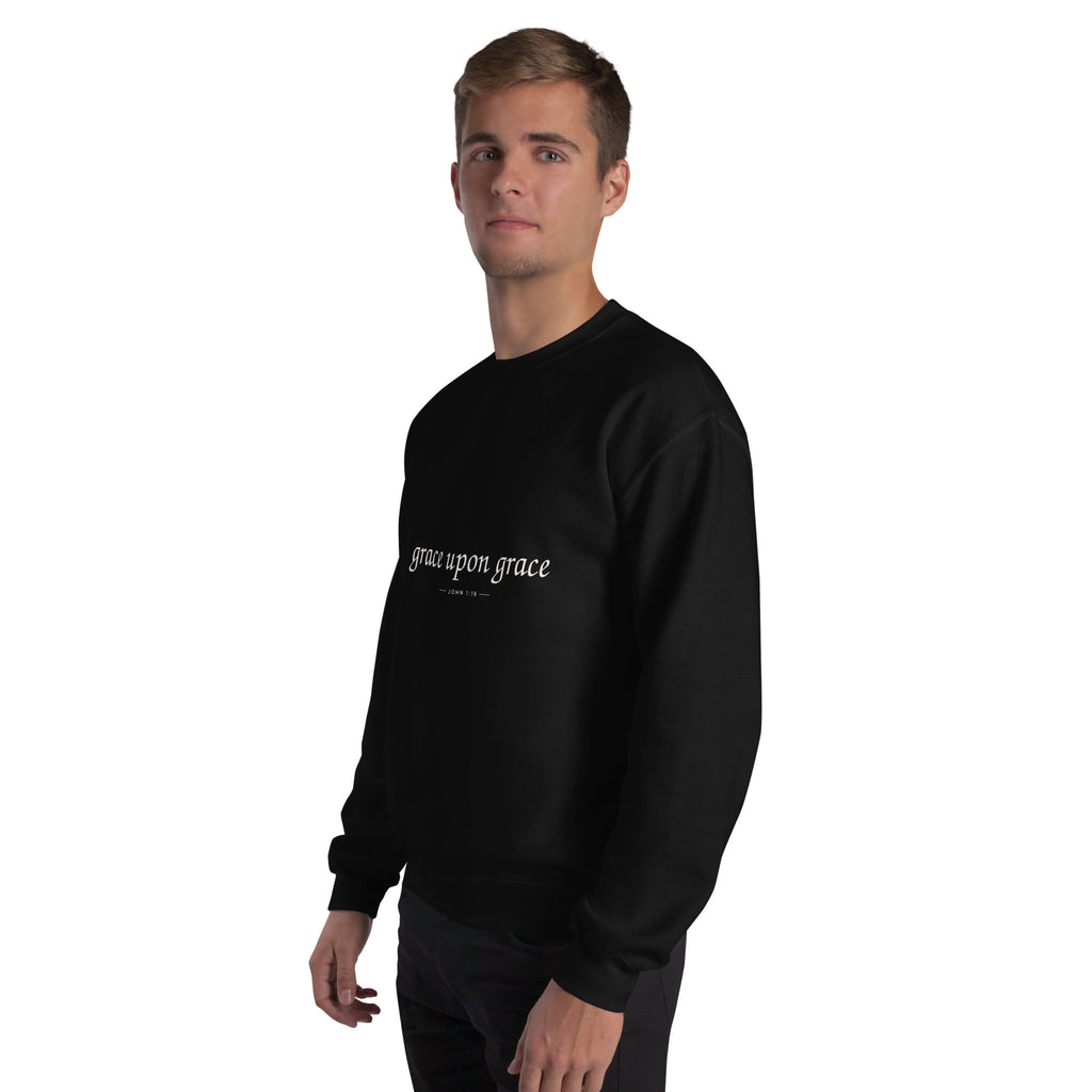 Grace Upon Grace Christian unisex crewneck sweatshirt in Black, left-front view on model