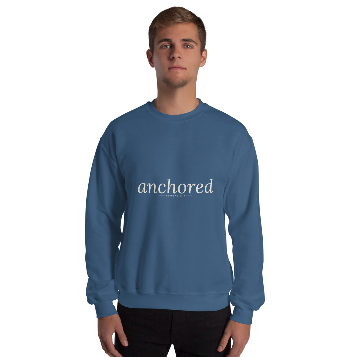 Anchored Christian unisex crewneck sweatshirt in Indigo Blue, front view on model