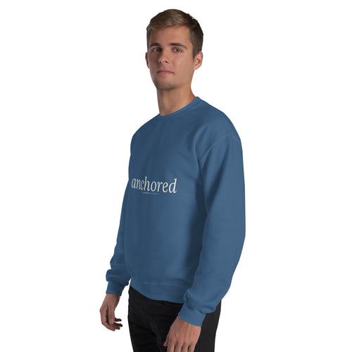 Anchored Christian unisex crewneck sweatshirt in Indigo Blue, left-front view on model