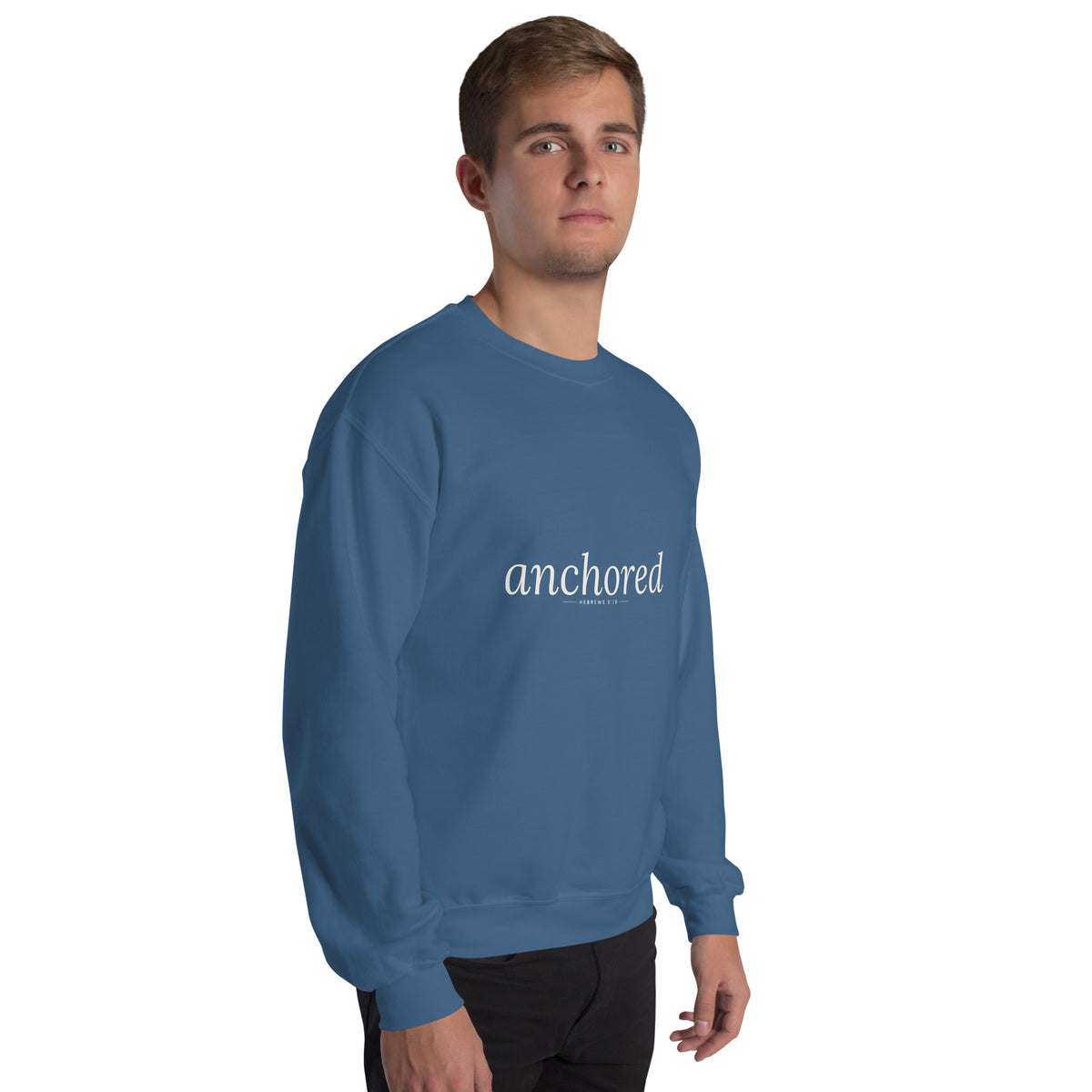 Anchored Christian unisex crewneck sweatshirt in Indigo Blue, right-front view on model