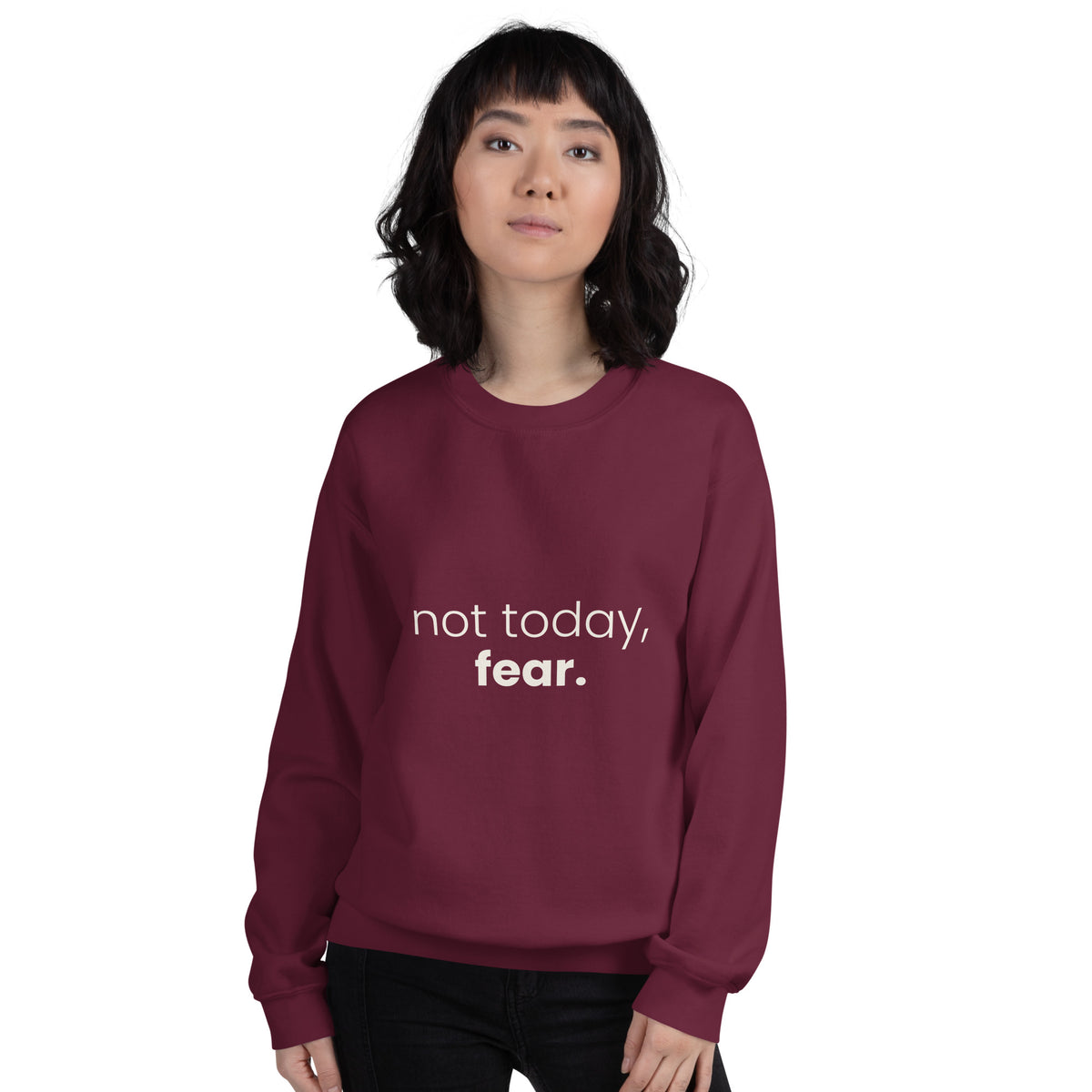 Not Today, Fear. Christian unisex crewneck sweatshirt in Maroon, front view on women's model
