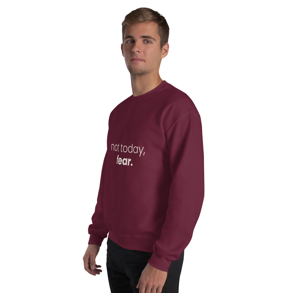 Not Today, Fear. Christian unisex crewneck sweatshirt in Maroon, left-front view on model