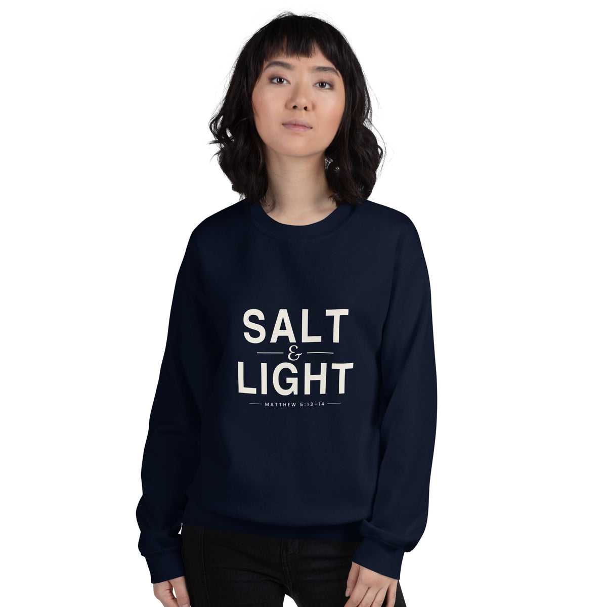 Salt & Light Christian unisex crewneck sweatshirt in Navy, front view on women's model