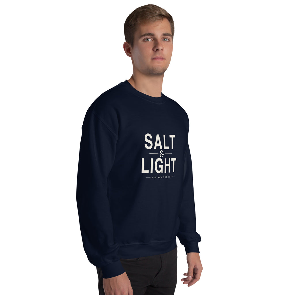 Salt & Light Christian unisex crewneck sweatshirt in Navy, right-front view on model
