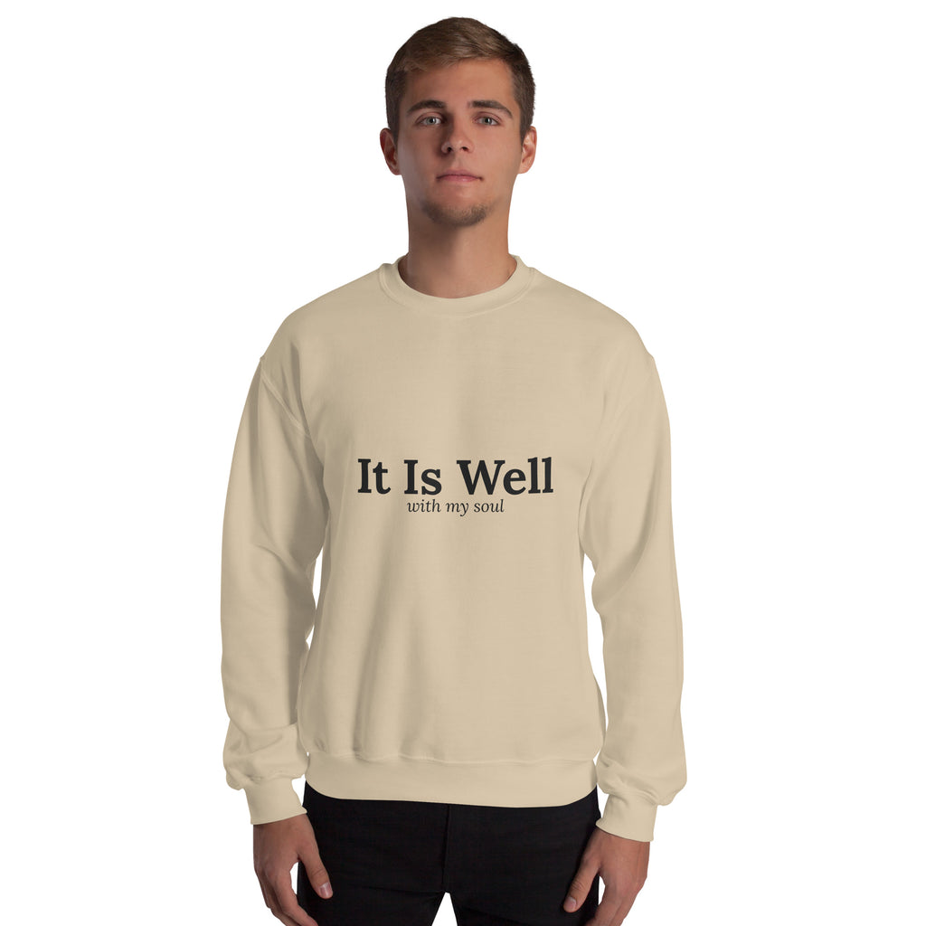 It Is Well Christian unisex crewneck sweatshirt in Sand, front view on model