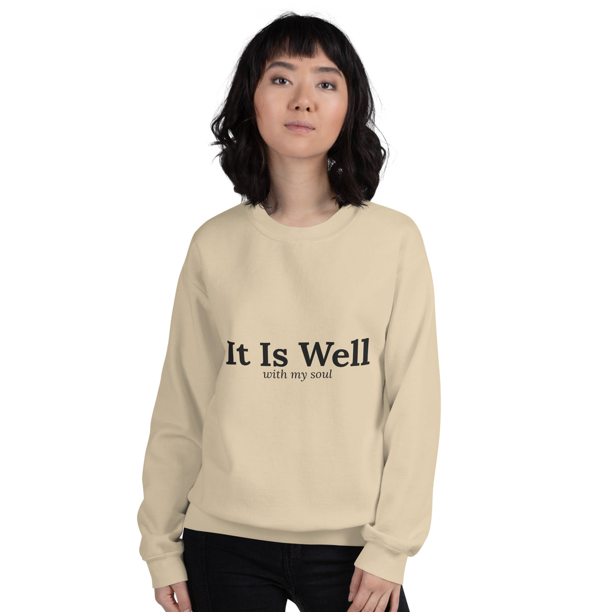 It Is Well Christian unisex crewneck sweatshirt in Sand, front view on women's model