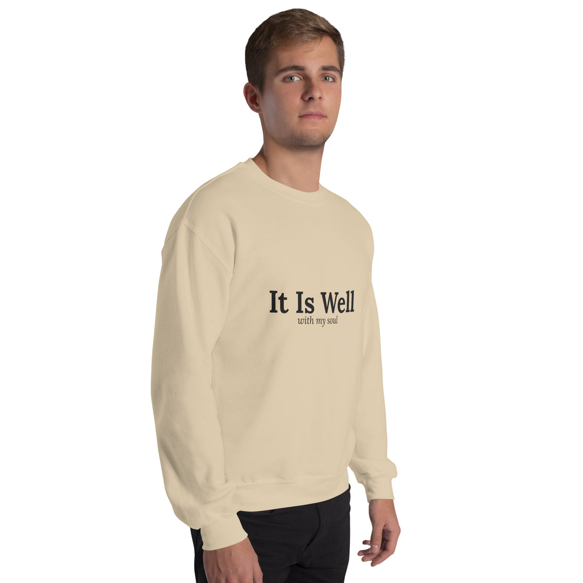 It Is Well Christian unisex crewneck sweatshirt in Sand, right-front view on model