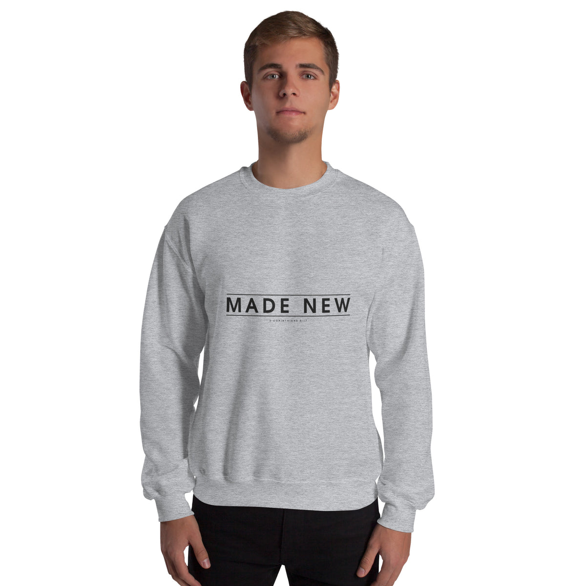 Made New Christian unisex crewneck sweatshirt in Sport Grey, front view on model