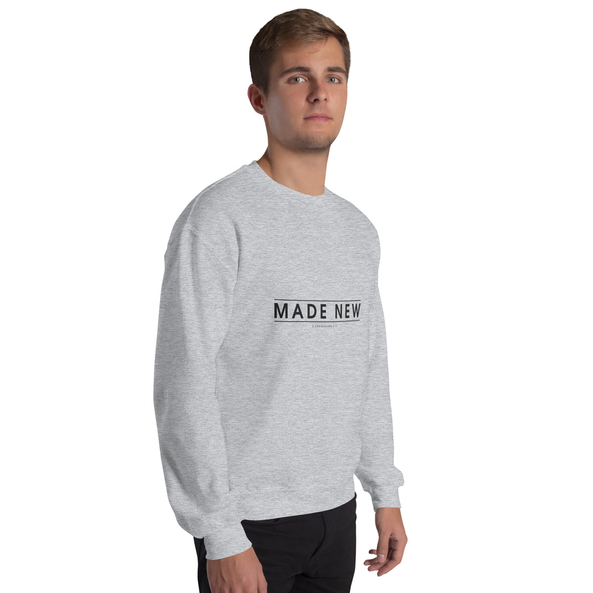 Made New Christian unisex crewneck sweatshirt in Sport Grey, right-front view on model
