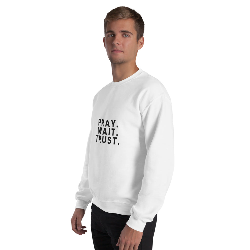 Pray. Wait. Trust. Christian unisex crewneck sweatshirt in White, left-front view on model