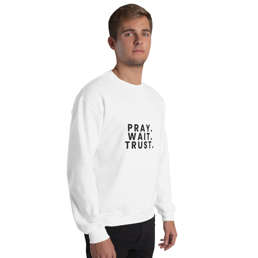 Pray. Wait. Trust. Christian unisex crewneck sweatshirt in White, right-front view on model