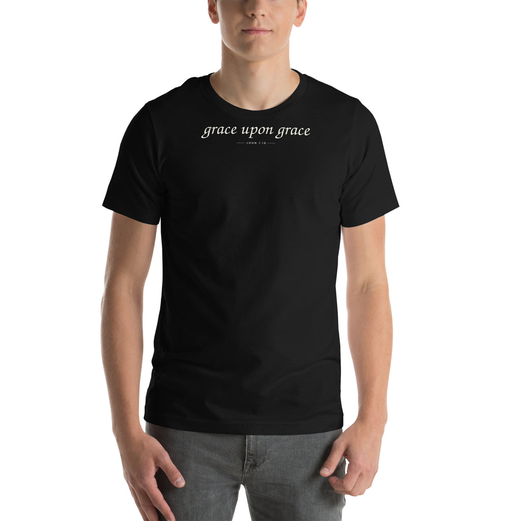 Grace Upon Grace Christian unisex tee in Black, front view on model