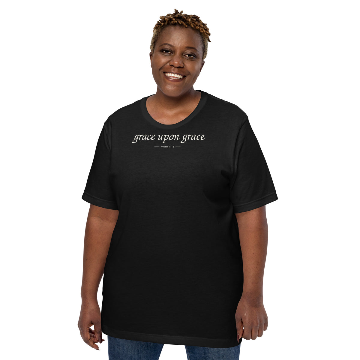 Grace Upon Grace Christian unisex tee in Black, front view on women's model