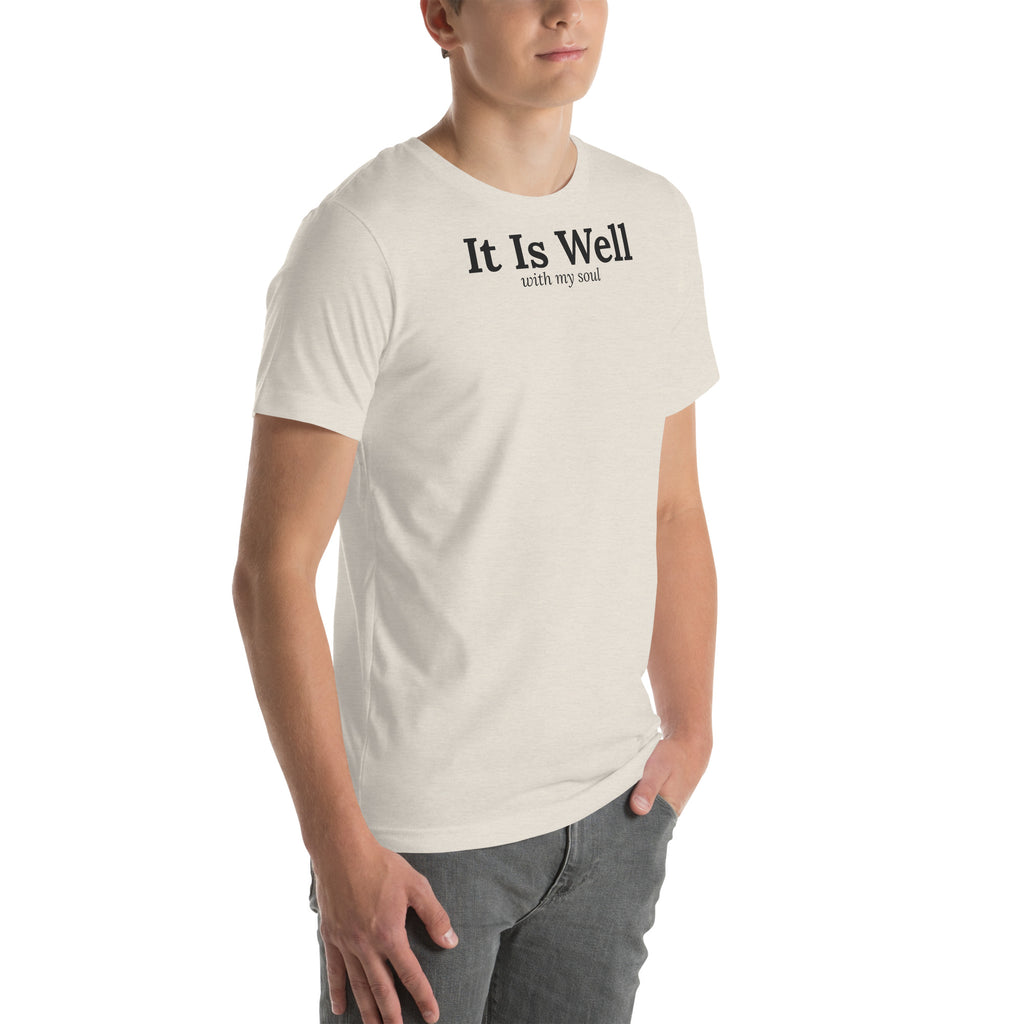 It Is Well Christian unisex tee in Heather Dust, right-front view on model