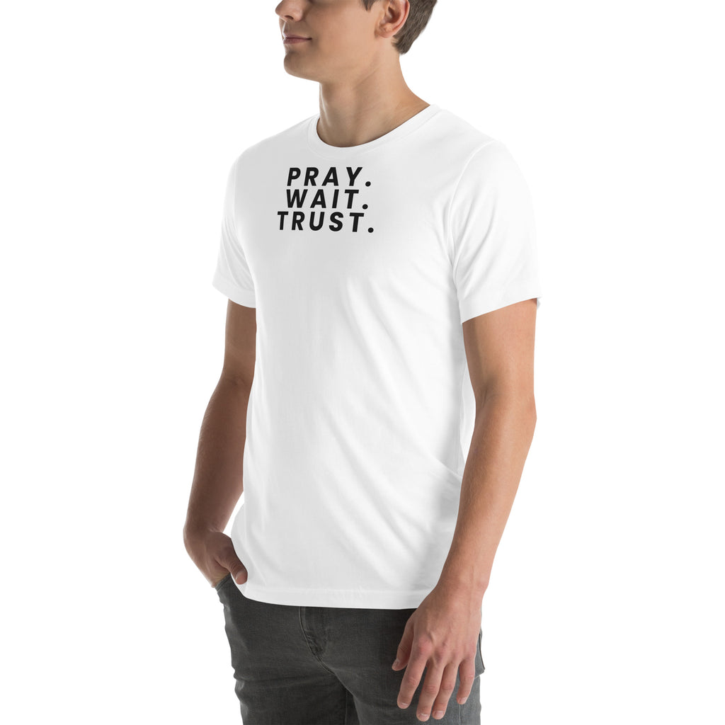 Pray. Wait. Trust. Christian unisex tee in White, left-front view on model